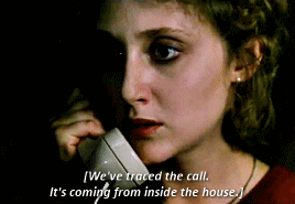 Animated gif from "When A Stranger Calls." A woman holds up a telephone; the text below reads "We've traced the call. It's coming from inside the house."